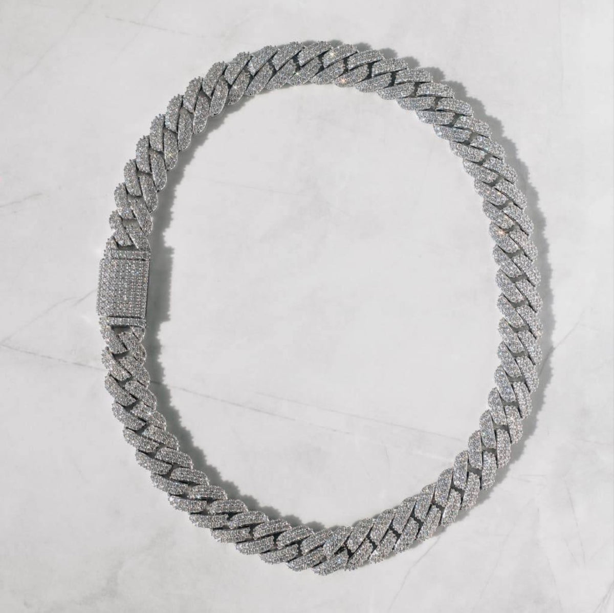 Buy the Cuban Link + Get 1 Piece Free | WHITE GOLD[br] EVERYTHING BELOW IS INCLUDED: [br] Cuban Link Chain[br] Cuban Link Bracelet [br](CZ Stones & 18k White Gold Plated)[br] 10MM image 0