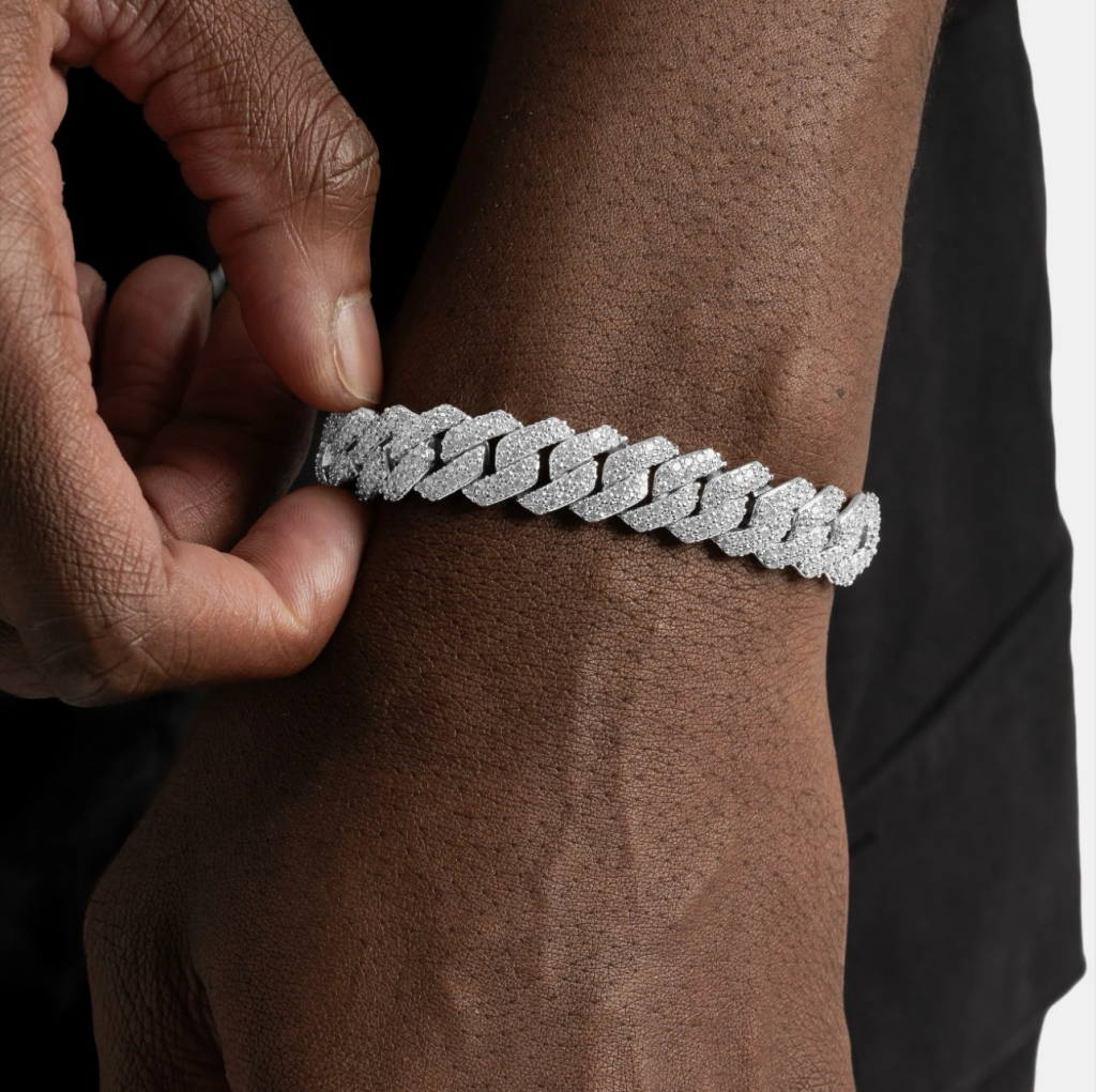 buy the cuban link + get 5 pieces free | white gold[br] everything below is included:[br] cuban link[br] cuban bracelet [br]tennis chain [br] tennis bracelet[br] kingdom clustered tennis bracelet [br] kingdom built presidential watch with blue dial [br] [br] (premium 18k white gold plated & cz stones)